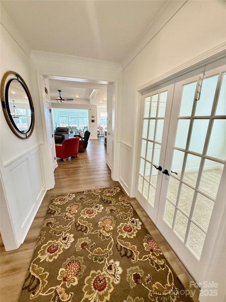 Foyer with Custom Trim and French Doors to Flex Room/Office