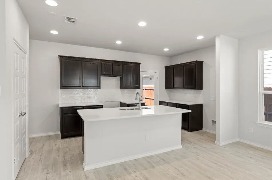 Front exterior of a new home in Heartland, Heartland, TX, highlighting curb appeal (Image 6). Front exterior of a new home in Heartland, Heartland, TX, highlighting curb appeal (Image 6).