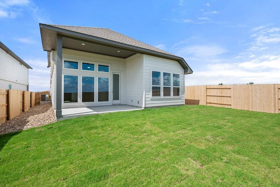Exterior details and patio area of a home in Terrace Collection At Turner's Crossing, Buda (Image 23). Exterior details and patio area of a home in Terrace Collection At Turner's Crossing, Buda (Image 23).
