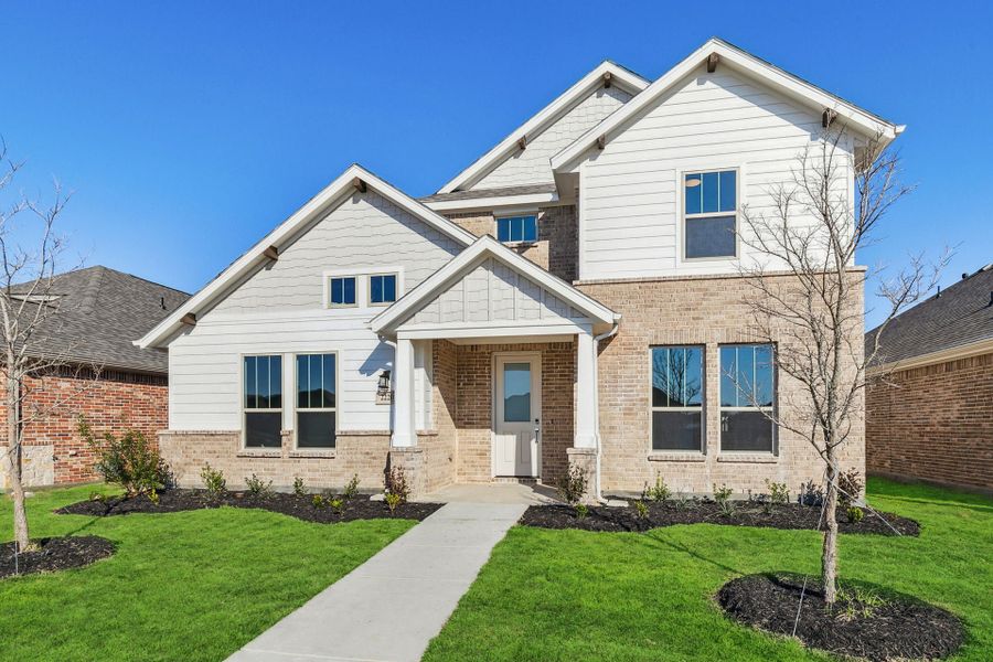 Front exterior of a new home in Dove Hollow, Waxahachie, TX, highlighting curb appeal (Image 18).