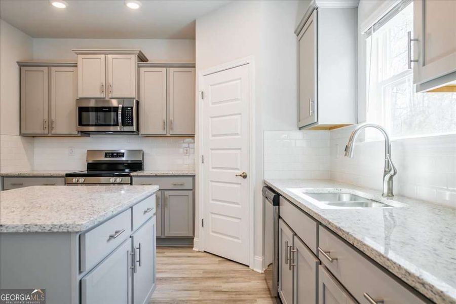 Furnished interior view inside a new home in Carson's Walk, Macon (Image 7).
