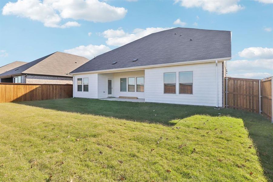 Exterior details and patio area of a home in Lakehaven - Premier Series, Farmersville (Image 3).