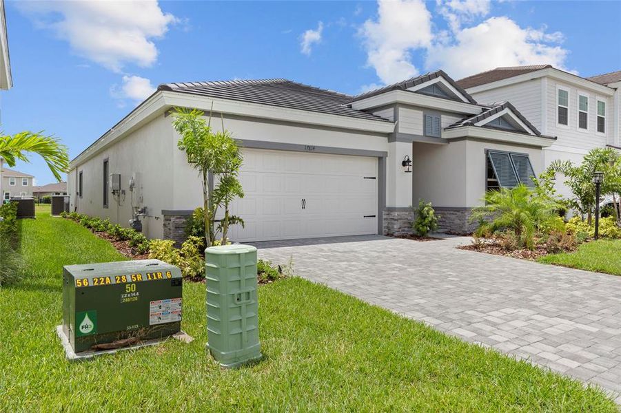 Front exterior of a new home in , Bradenton, FL, highlighting curb appeal (Image 27). Front exterior of a new home in , Bradenton, FL, highlighting curb appeal (Image 27).