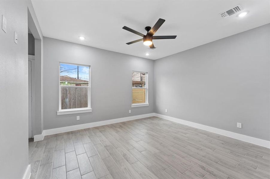 Primary bedrooms has a custom walk-in closet with built-in cabinetry.