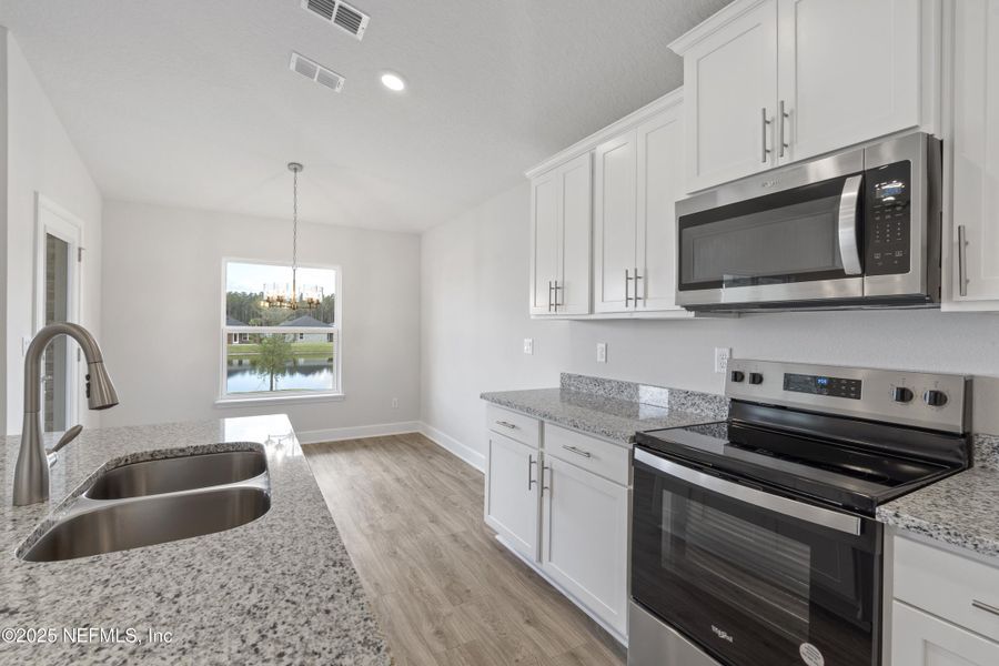 Furnished interior view inside a new home in Shadow Crest at Rolling Hills, Green Cove Springs (Image 3).