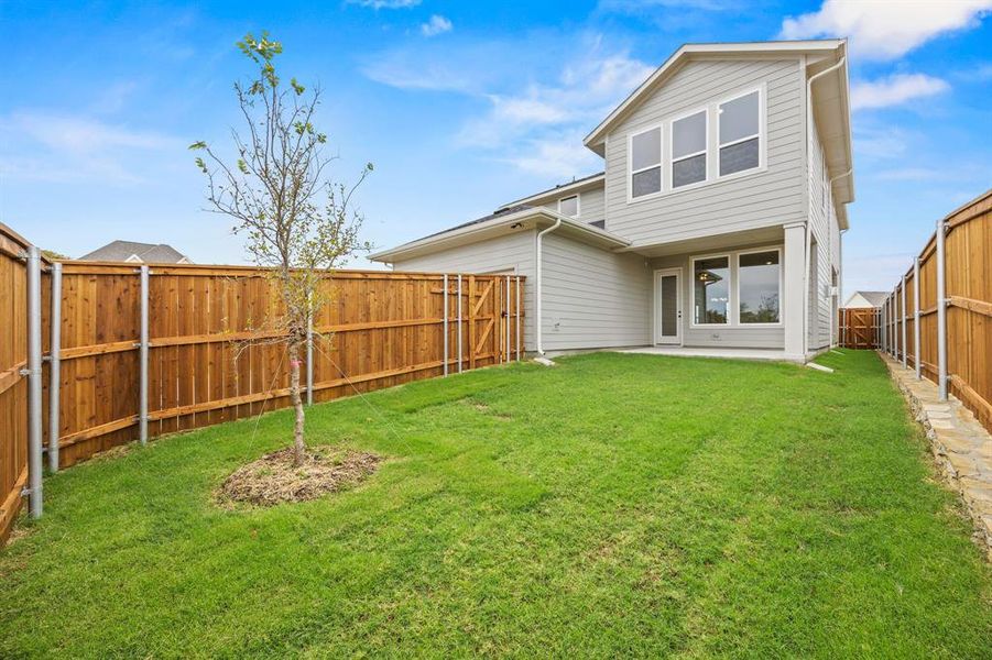 Exterior details and patio area of a home in The Heights at Uptown Celina, Celina (Image 18). Exterior details and patio area of a home in The Heights at Uptown Celina, Celina (Image 18).