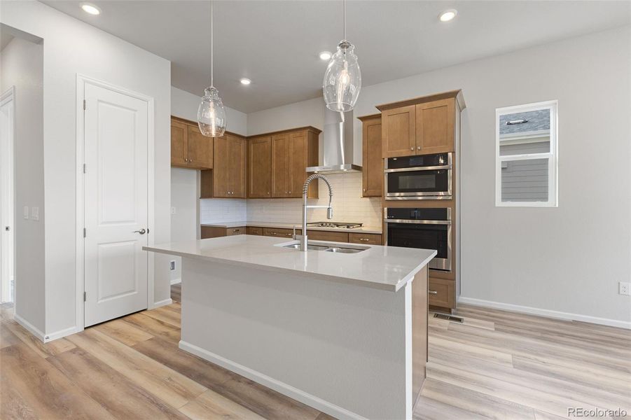 Furnished interior view inside a new home in The Manors Collection at Golden Overlook, Lakewood (Image 9).