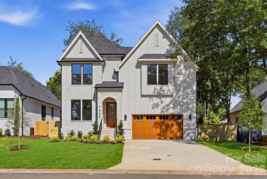 Front exterior of a new home in , Charlotte, NC, highlighting curb appeal (Image 25).