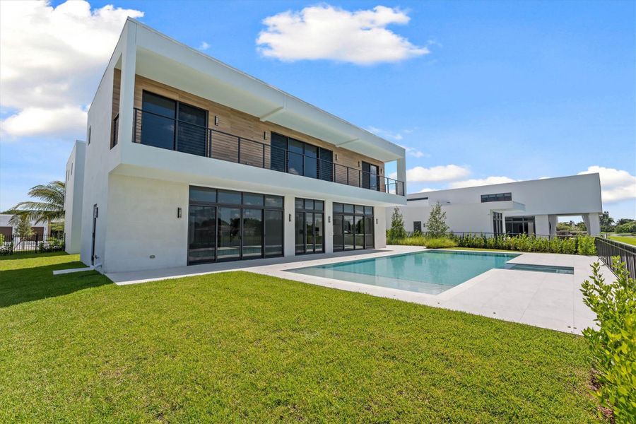 Exterior details and patio area of a home in , Weston (Image 48).