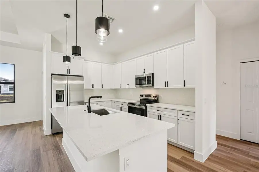 Furnished interior view inside a new home in , North Port (Image 9).