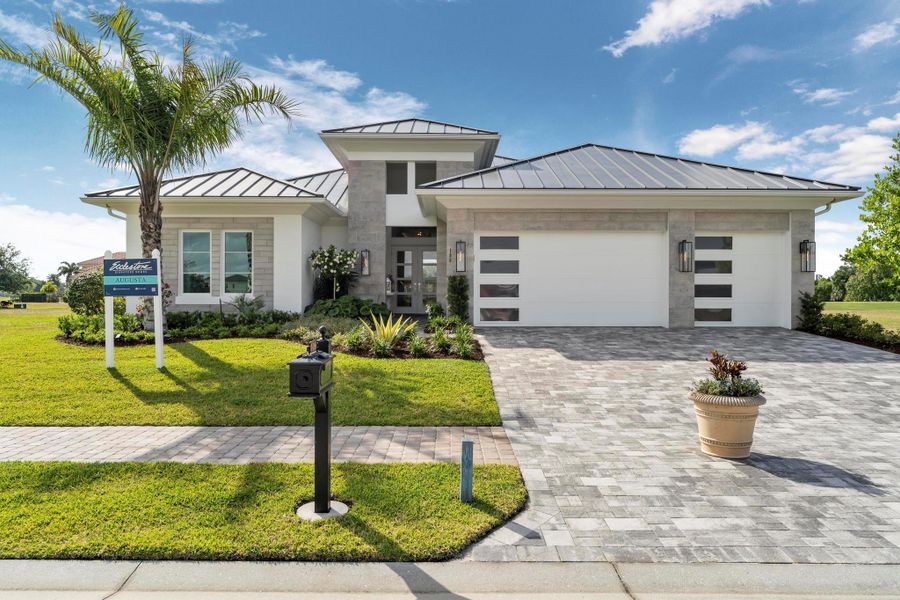 Front exterior of a new home in , Port St. Lucie, FL, highlighting curb appeal (Image 23).