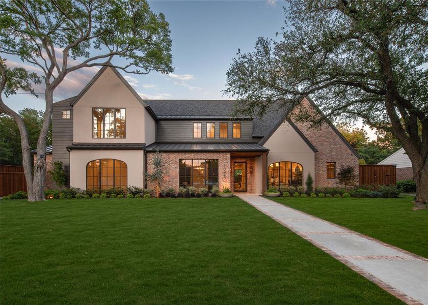 Front exterior of a new home in , Dallas, TX, highlighting curb appeal (Image 23).