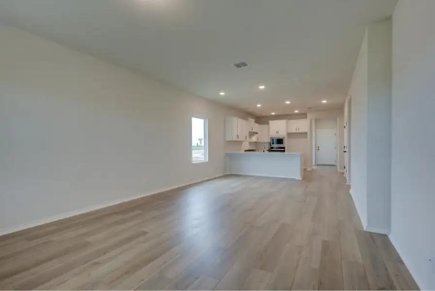 Representative unfurnished interior of a home built from the Brodie by Ashton Woods in Saddlebrook Ranch, Schertz (Image 10).