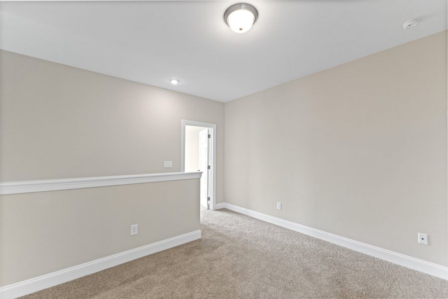 Representative unfurnished interior of a home built from the The Juniper by RobuckHomes in Kennebec Crossing, Angier (Image 102).
