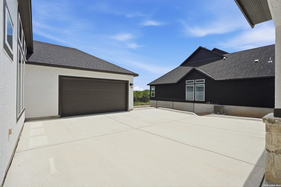 Exterior details and patio area of a home in , Castroville (Image 3).