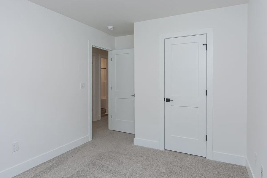 Representative unfurnished interior of a home built from the 1808 Townhome by Adams Homes in Parkstone Place Townhomes, Roebuck (Image 19). Representative unfurnished interior of a home built from the 1808 Townhome by Adams Homes in Parkstone Place Townhomes, Roebuck (Image 19).