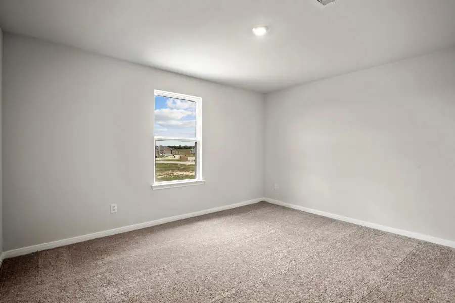 Spacious, unfurnished interior of a new home in Freeman Ranch, Katy (Image 8).
