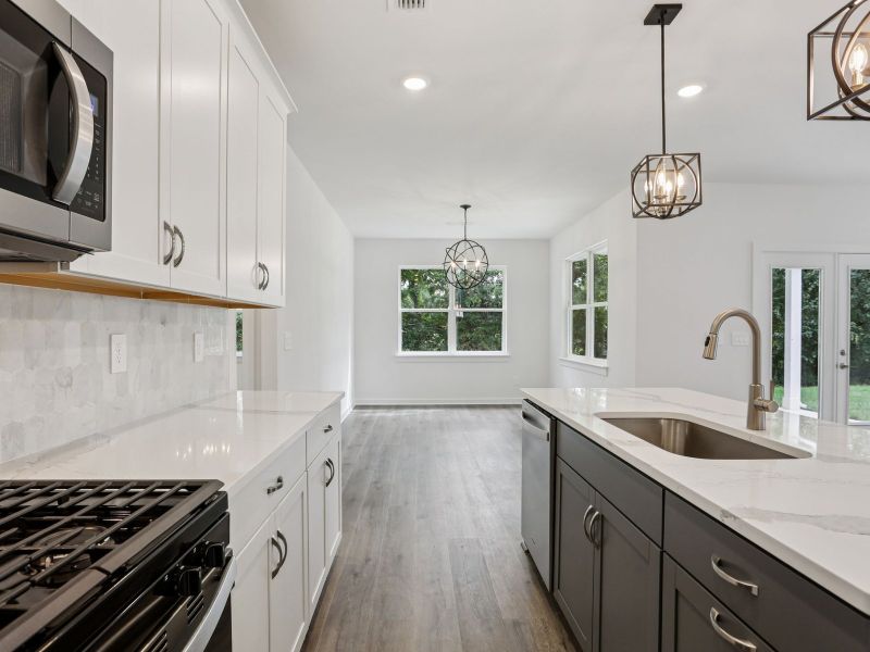 Prep dinner in the kitchen without missing the conversation in the great room.