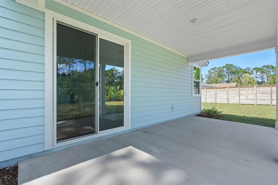 Exterior details and patio area of a home in Palm Coast Homes, Palm Coast (Image 29).