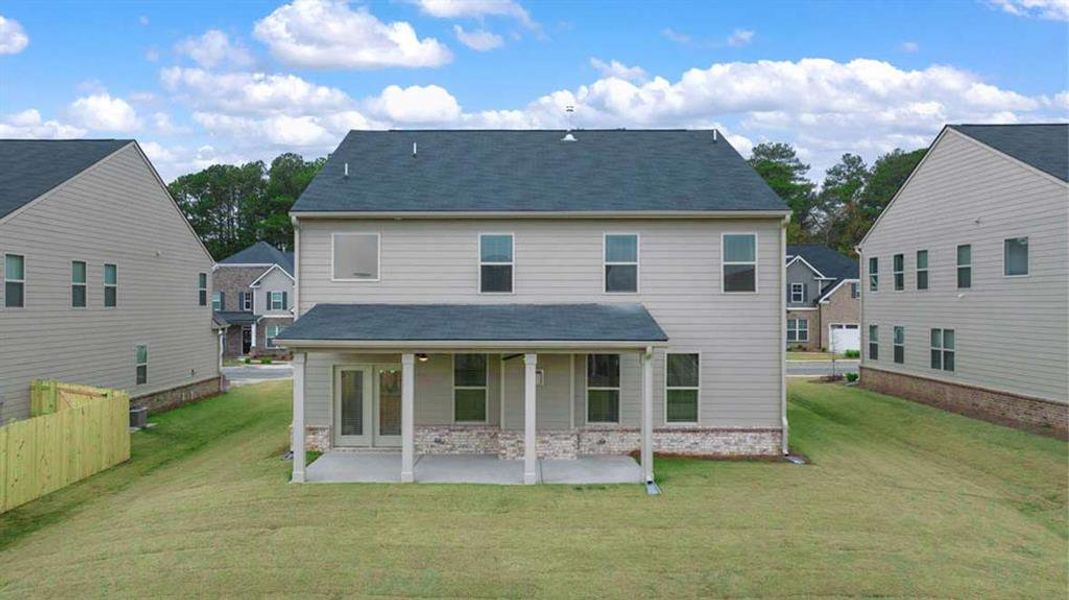 Exterior details and patio area of a home in Heritage Pointe, Senoia (Image 2). Exterior details and patio area of a home in Heritage Pointe, Senoia (Image 2).