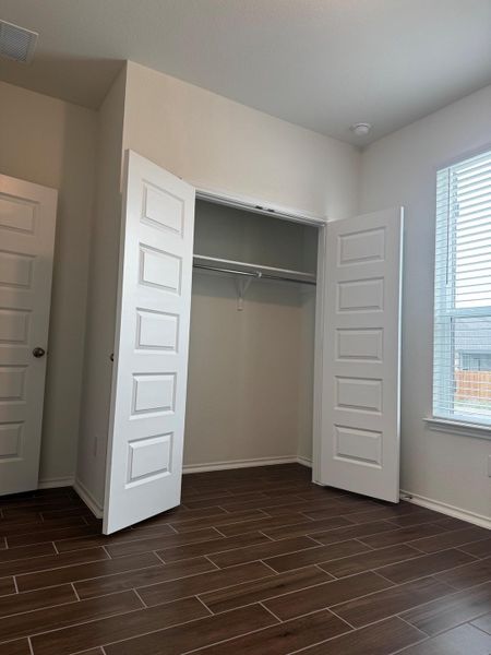 First bedroom with double door closet for easy access