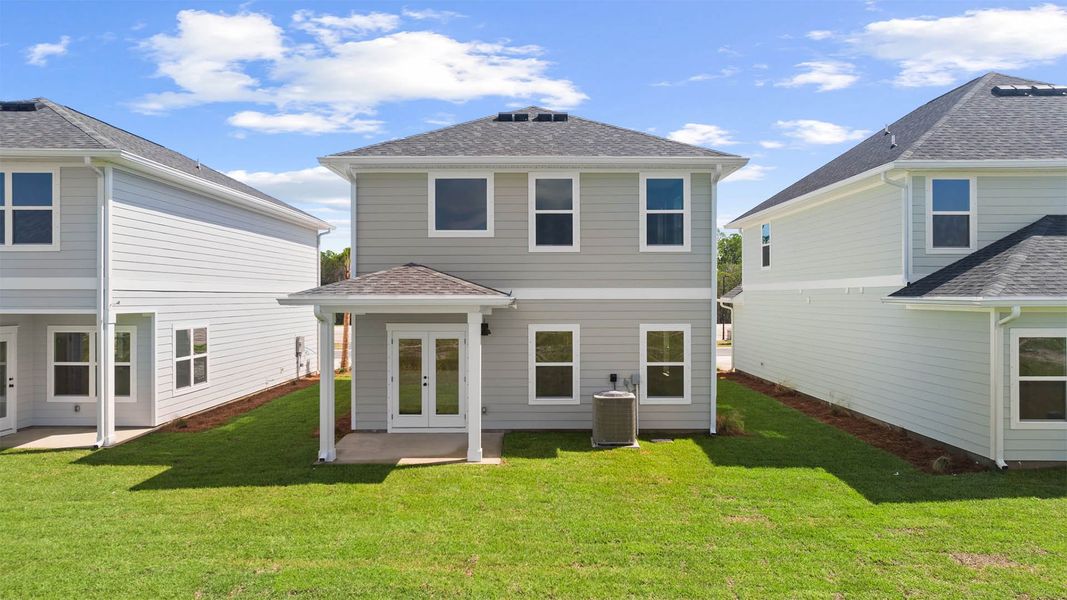 Exterior details and patio area of a home in Colonial East, Panama City Beach (Image 2). Exterior details and patio area of a home in Colonial East, Panama City Beach (Image 2).