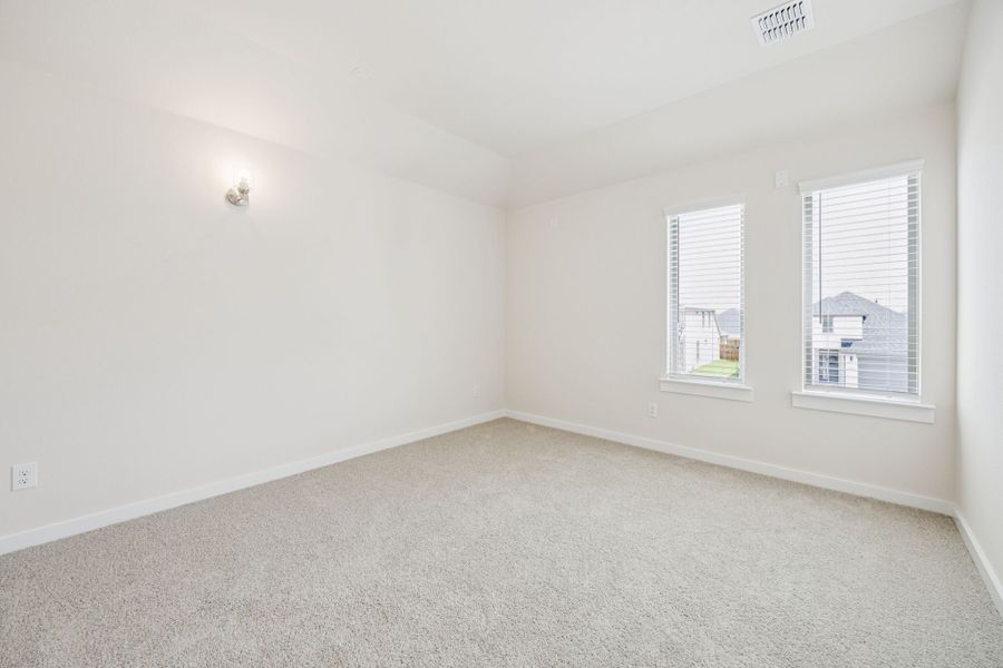 Media Room in the Claret home plan by Trophy Signature Homes – REPRESENTATIVE PHOTO