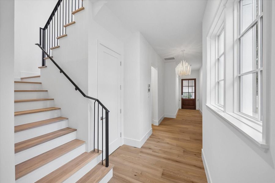Grand Staircase to the second level with white oak treads Grand Staircase to the second level with white oak treads