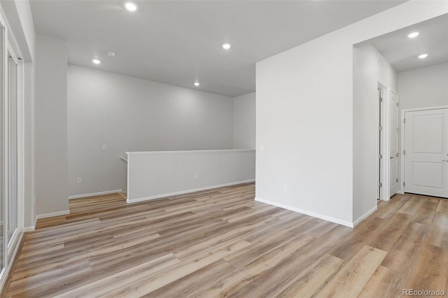 Spacious, unfurnished interior of a new home in The Manors Collection at Golden Overlook, Lakewood (Image 16).