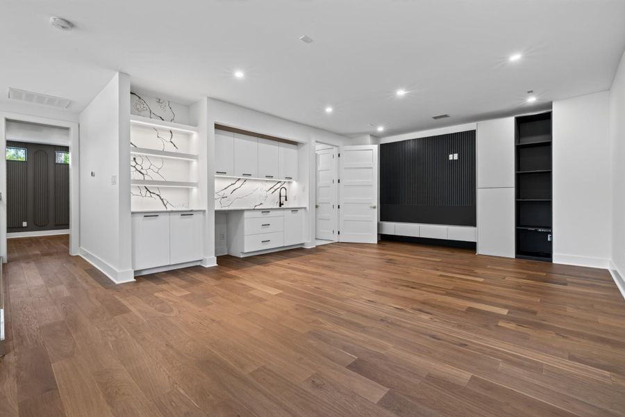 Spacious secondary living area offers flexibility for a game room, media space or additional lounge.