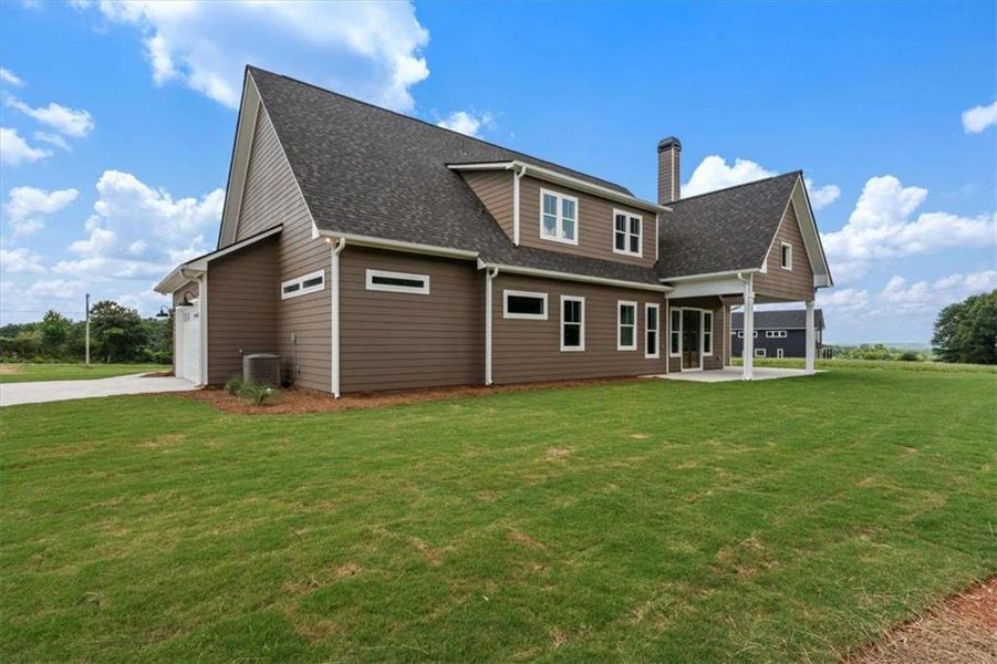 Front exterior of a new home in , Roopville, GA, highlighting curb appeal (Image 26).