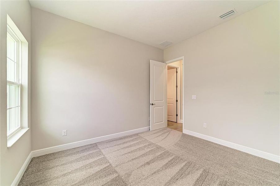 Spacious, unfurnished interior of a new home in North River Ranch, Parrish (Image 25).