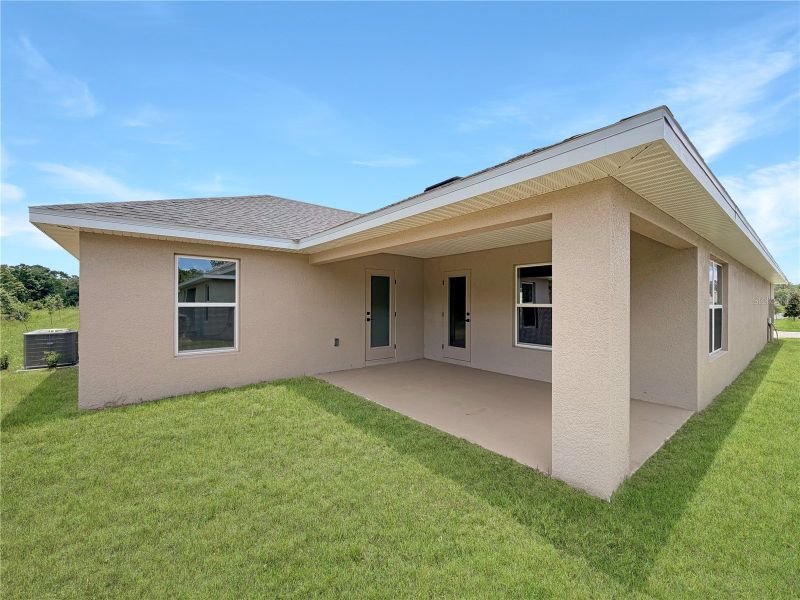 Exterior details and patio area of a home in Harmony Central, Harmony (Image 4).