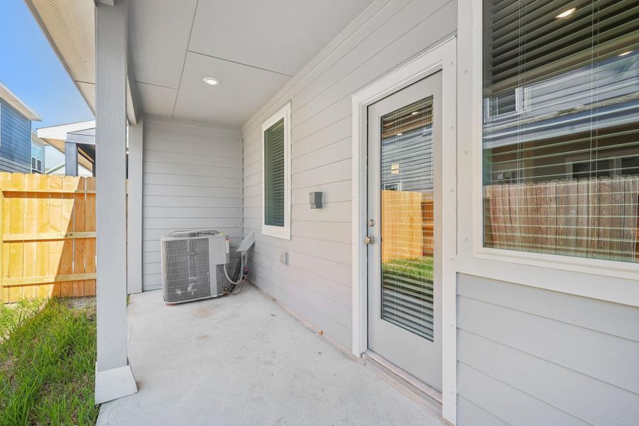 Exterior details and patio area of a home in Kemah Crossing - City Series, Kemah (Image 3). Exterior details and patio area of a home in Kemah Crossing - City Series, Kemah (Image 3).