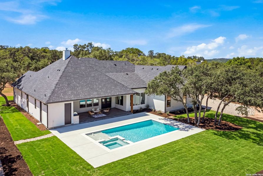 Exterior details and patio area of a home in , Boerne (Image 26).