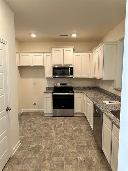 Furnished interior view inside a new home in , Decatur (Image 5).