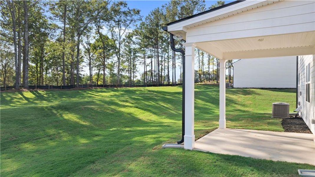 Exterior details and patio area of a home in Kingston Ranch at Lake Oconee, Buckhead (Image 4). Exterior details and patio area of a home in Kingston Ranch at Lake Oconee, Buckhead (Image 4).
