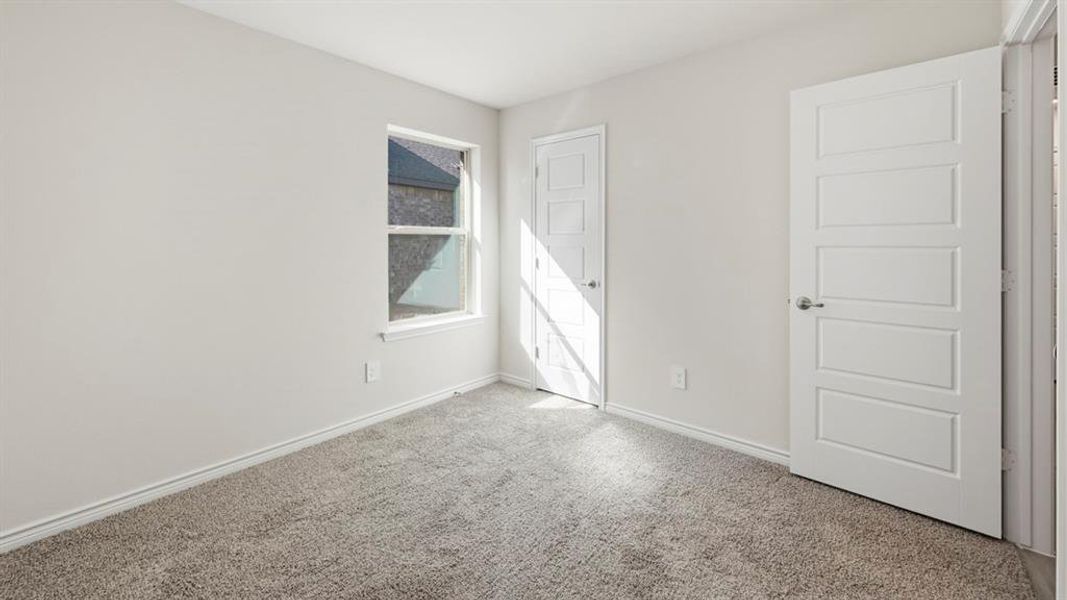 Spacious, unfurnished interior of a new home in The Woods at Lindsey Place, Anna (Image 25).