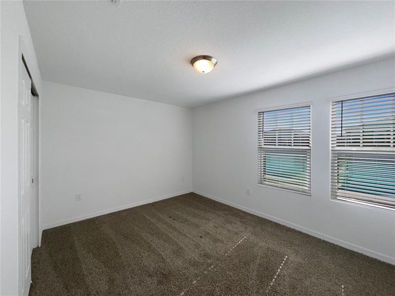 Spacious, unfurnished interior of a new home in Eden Hills, Lake Alfred (Image 20).