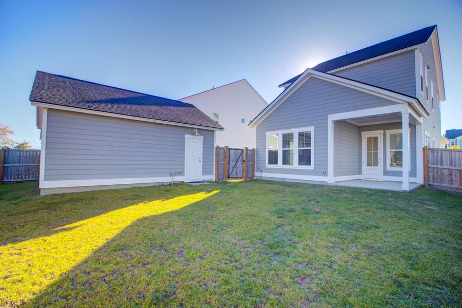 Exterior details and patio area of a home in Carnes Crossroads: Row Collection, Summerville (Image 22). Exterior details and patio area of a home in Carnes Crossroads: Row Collection, Summerville (Image 22).