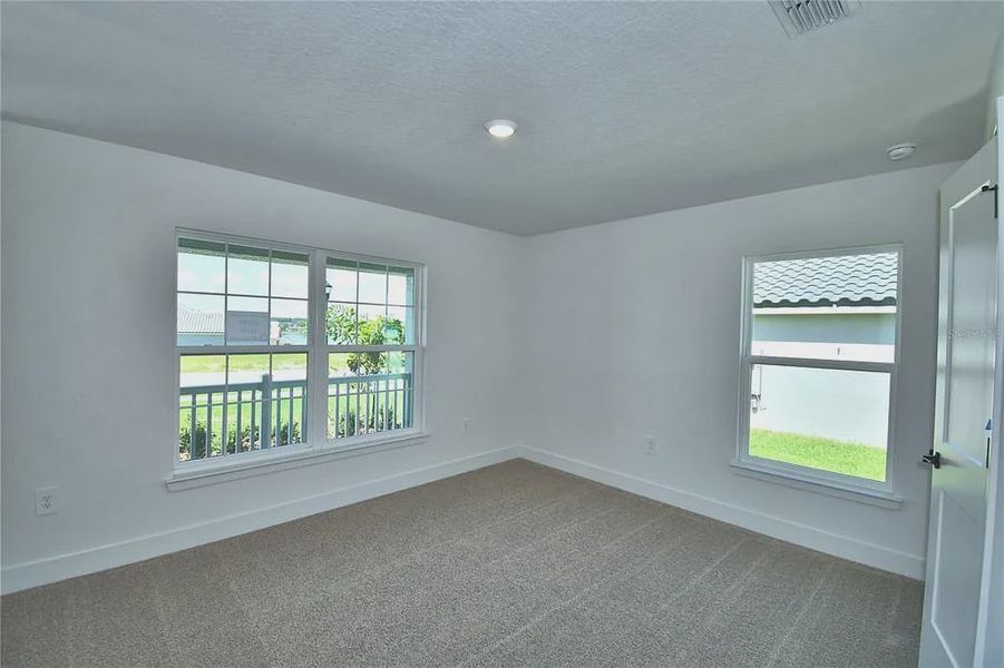 Spacious, unfurnished interior of a new home in Lake Juliana Estates, Auburndale (Image 24).