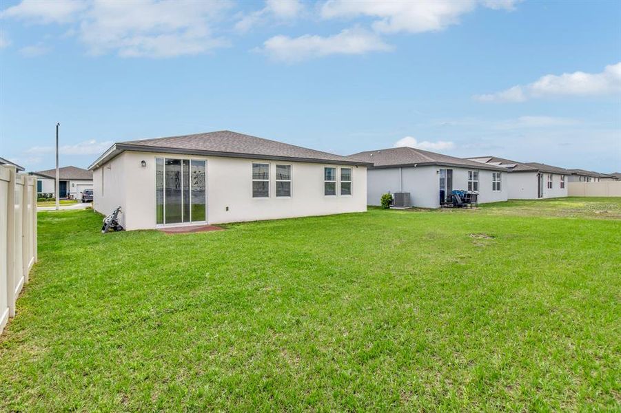 Exterior details and patio area of a home in Lawson Dunes - Signature Series, Haines City (Image 3).