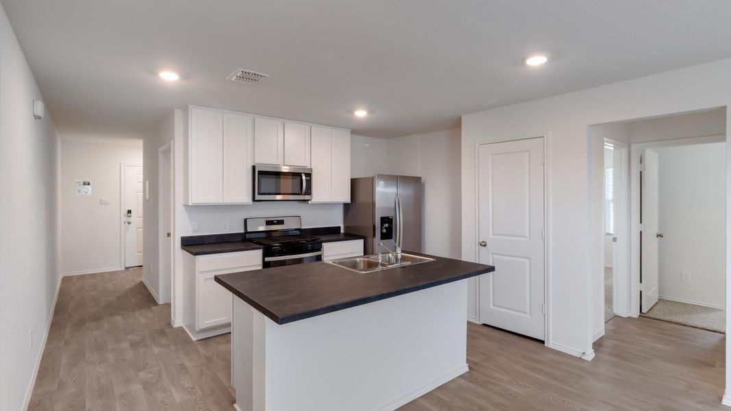 Furnished interior view inside a new home in Prairie Lakes, Buda (Image 6).