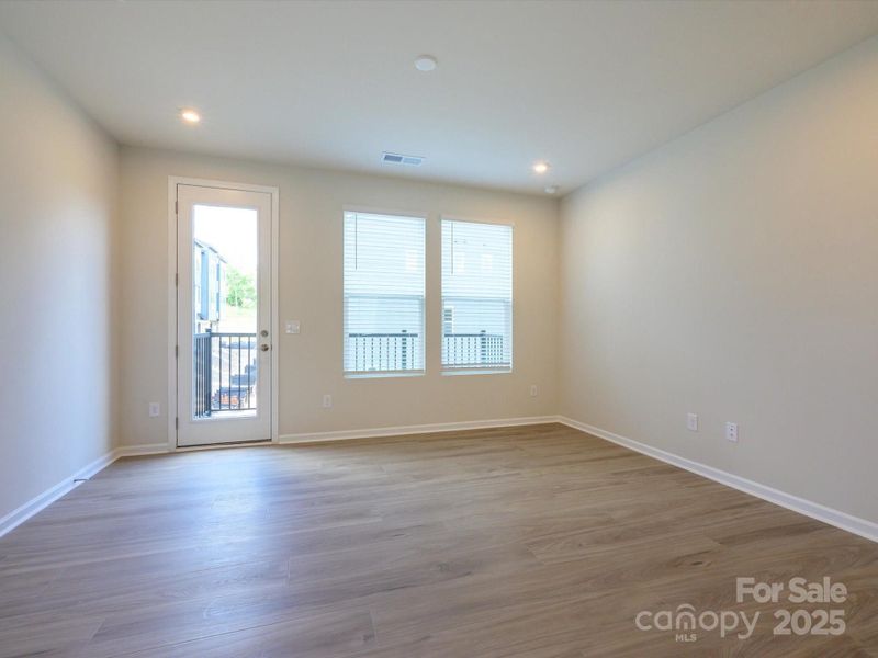 Great Room Leading to Outdoor Living Through 8' Doorway.