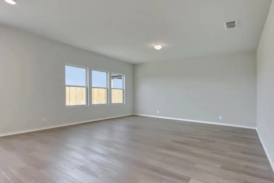Representative unfurnished interior of a home built from the Colton by Ashton Woods in Saddlebrook Ranch, Schertz (Image 8).