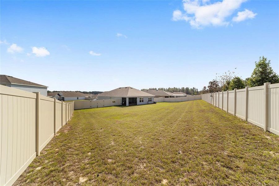 Exterior details and patio area of a home in Huntington Ridge, Ocala (Image 26).