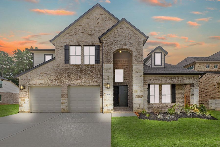 Front exterior of a new home in Barton Creek Ranch, Conroe, TX, highlighting curb appeal (Image 12). Front exterior of a new home in Barton Creek Ranch, Conroe, TX, highlighting curb appeal (Image 12).