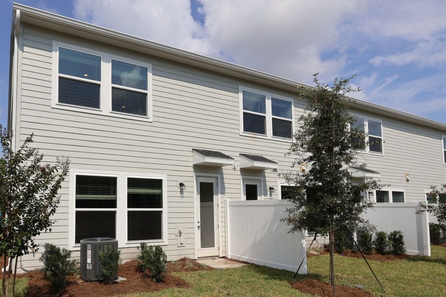 Exterior details and patio area of a home in Preserve at The Cays – The Harbor Series, Daytona Beach (Image 3).