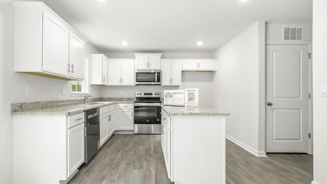 Representative furnished interior of a home built from the Kyle by D.R. Horton in Evergreen Landing, Lexington (Image 5).