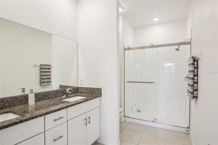 Master bath with view of shower. Master bath with view of shower.